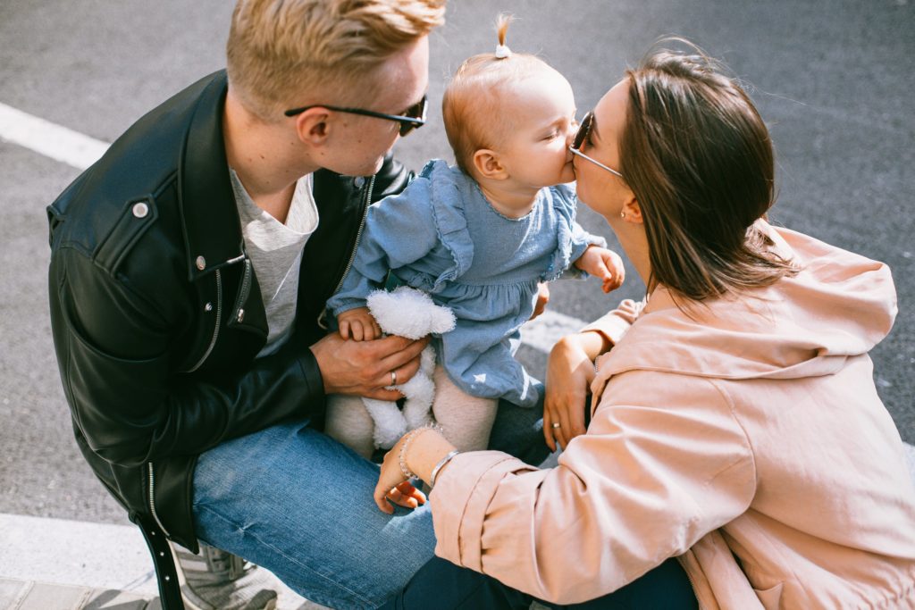 a person holding a baby