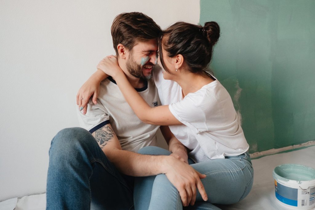 a man and woman kissing