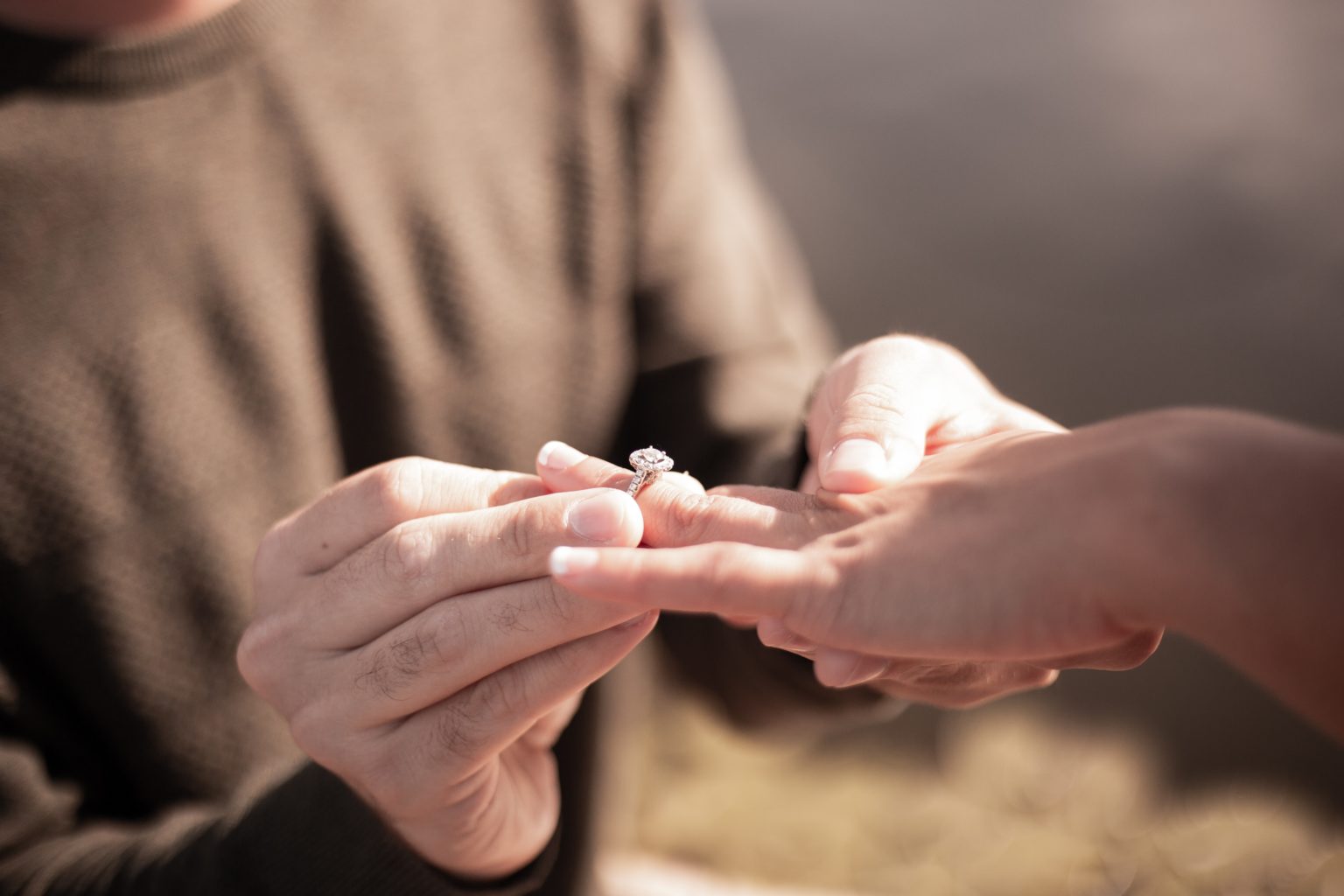 a person holding hands together