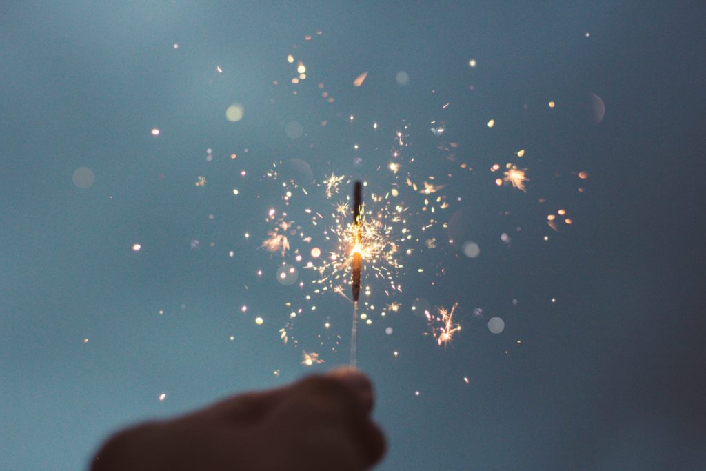 a person holding a candle