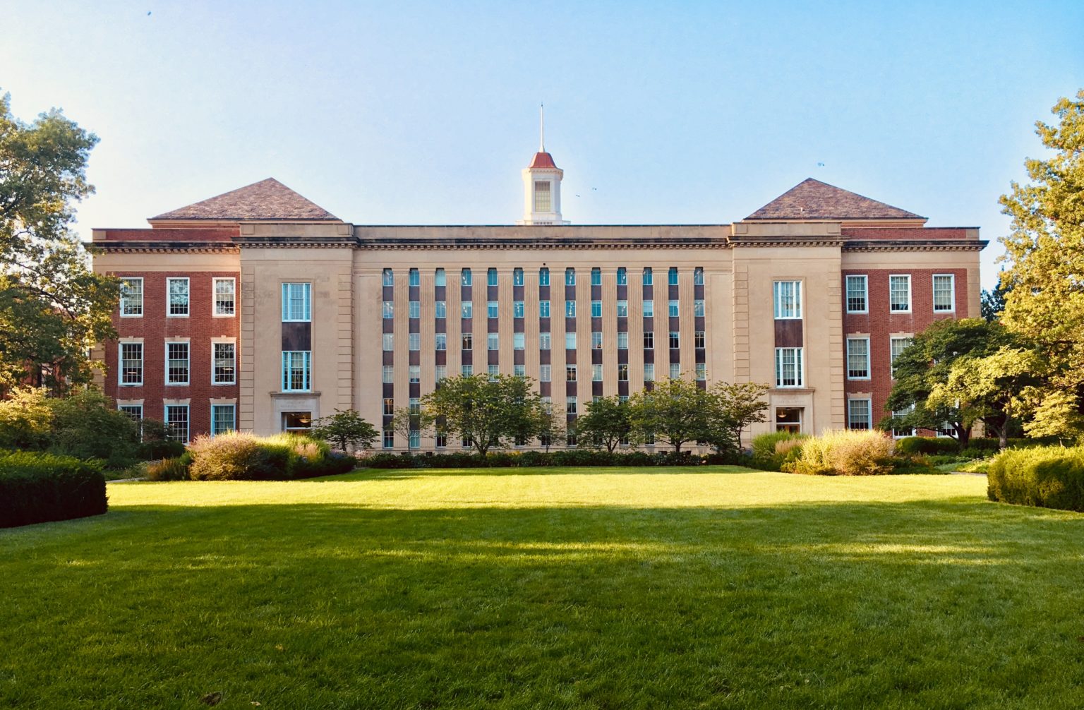 a large building with a lawn