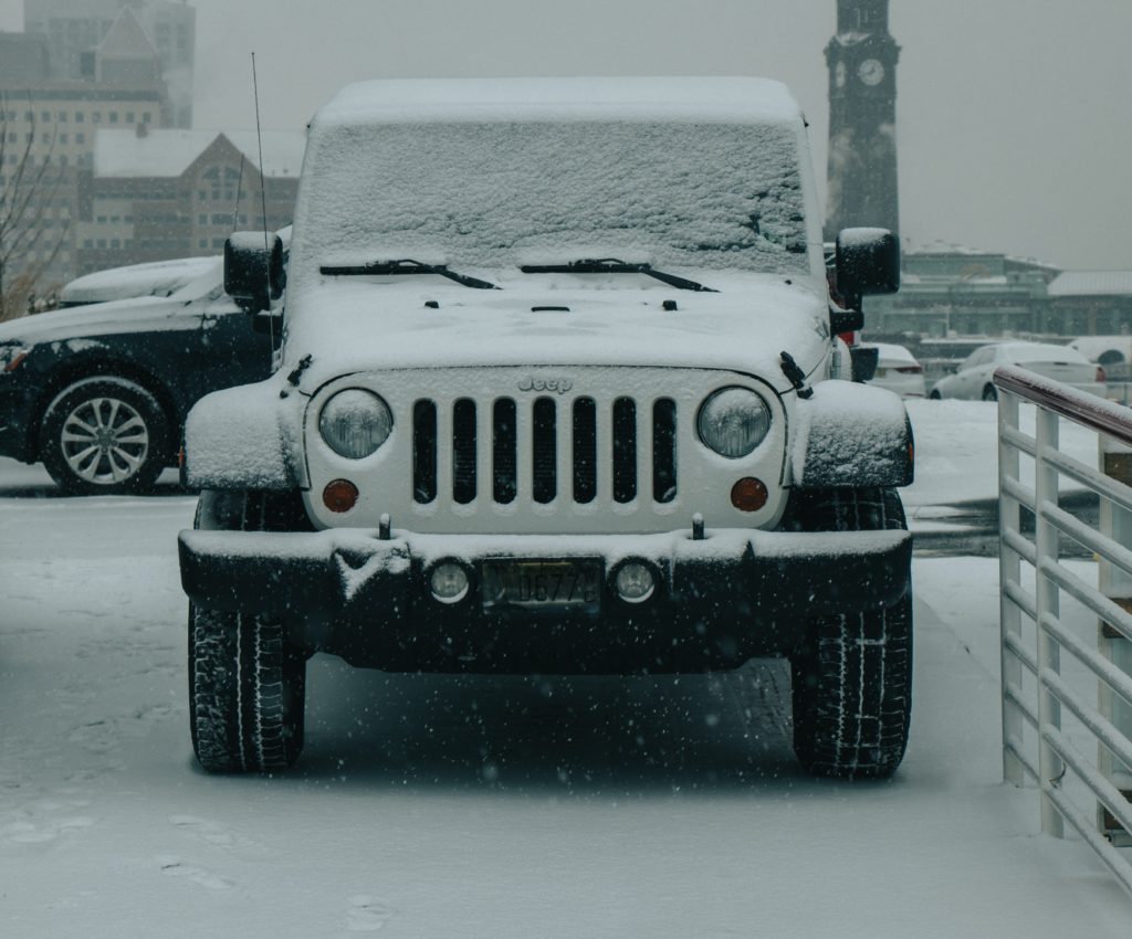 a truck parked in the snow