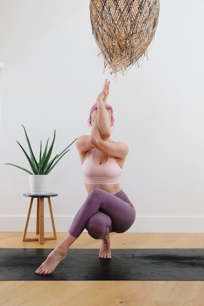 a person sitting on a stool