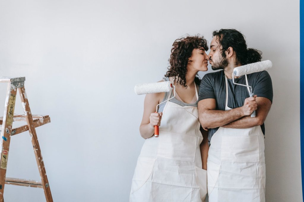 a man and a woman in white