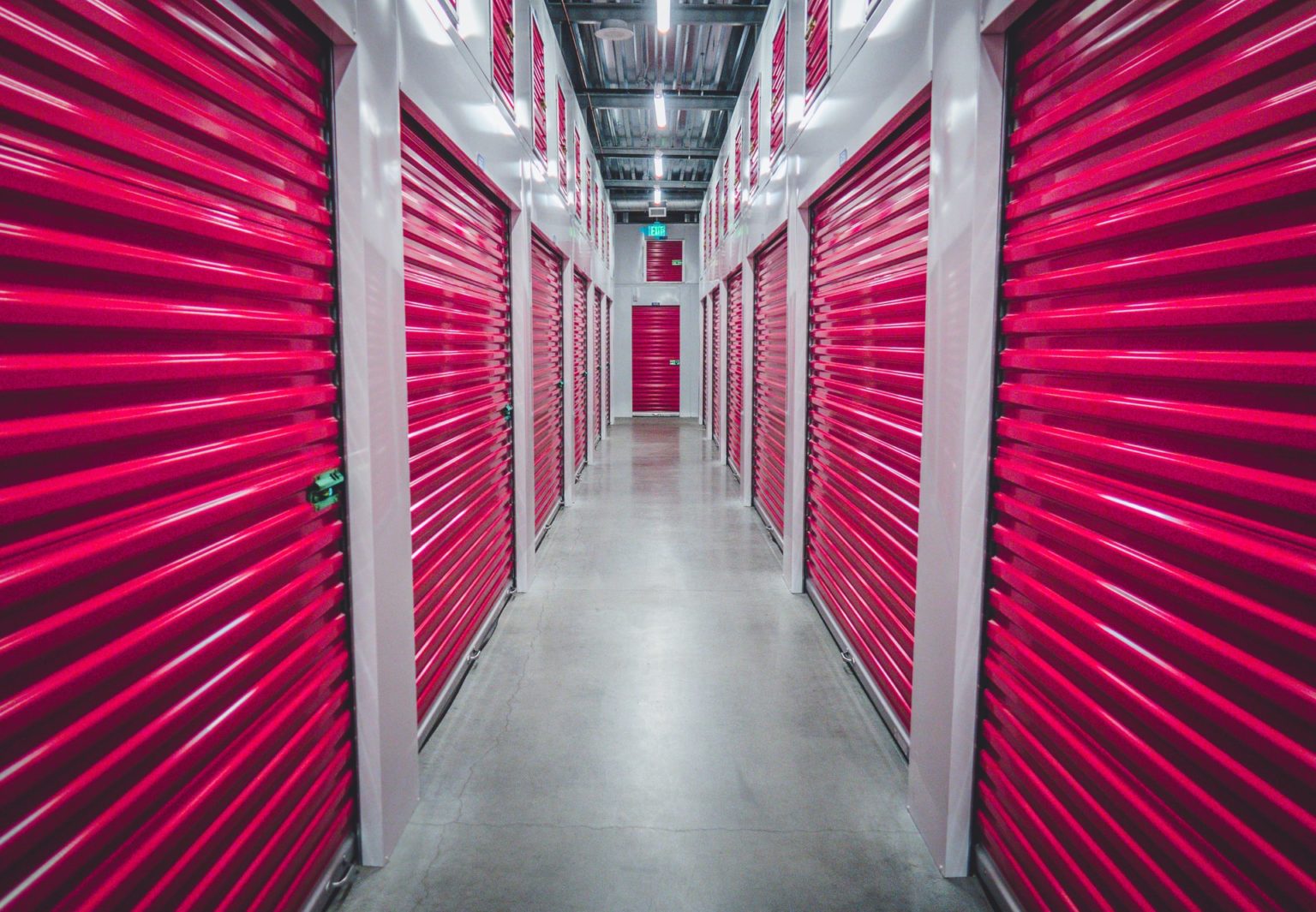 a hallway with red walls