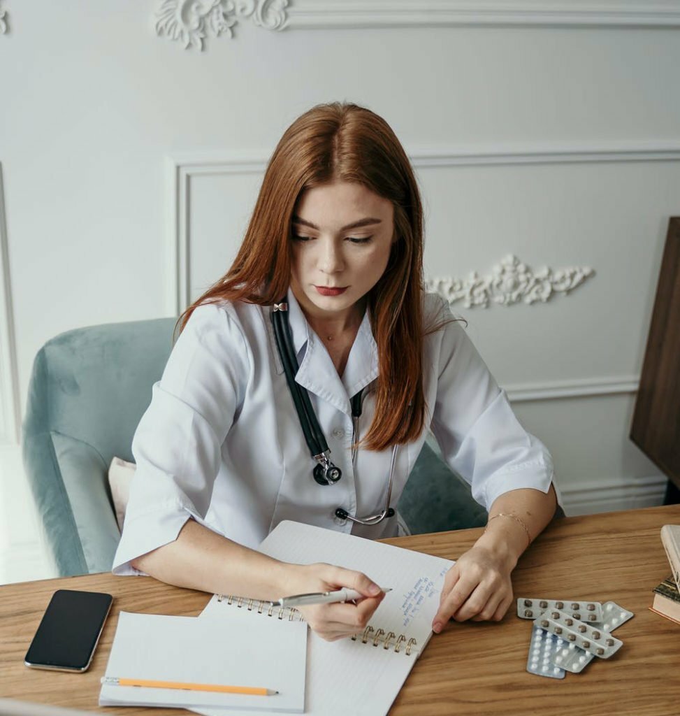 a woman sitting at a desk