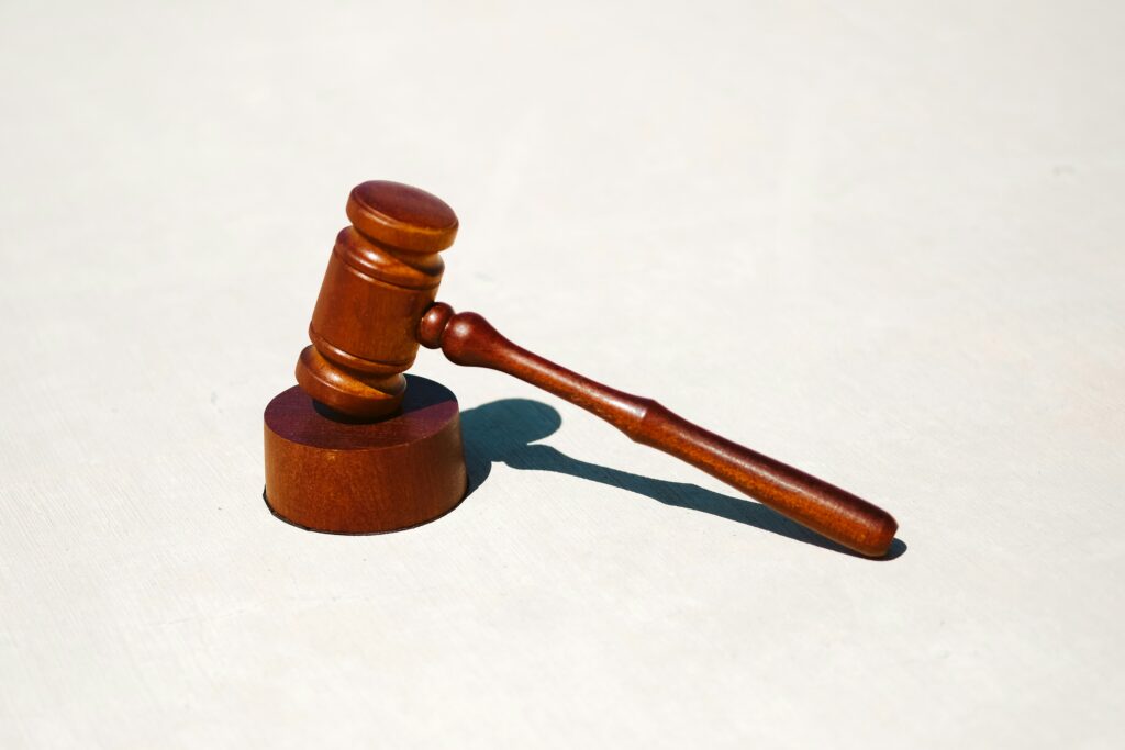 a wooden gavel with a wooden handle